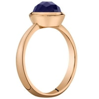 Prsten pasijansa s plavim safirom okruglog oblika.2. 14k ružičastog zlata
